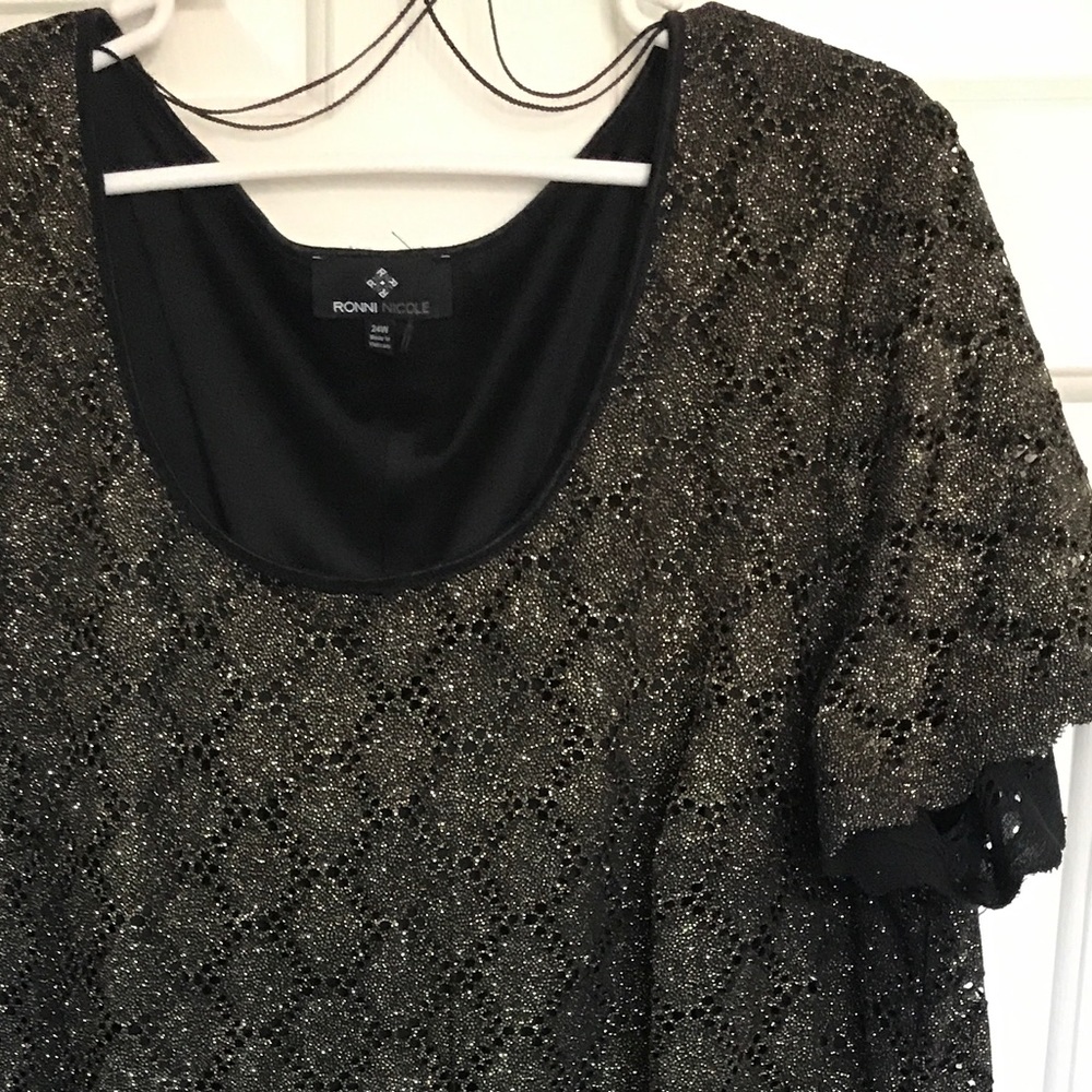 Worn once black/gold dress. Hits right at the knee